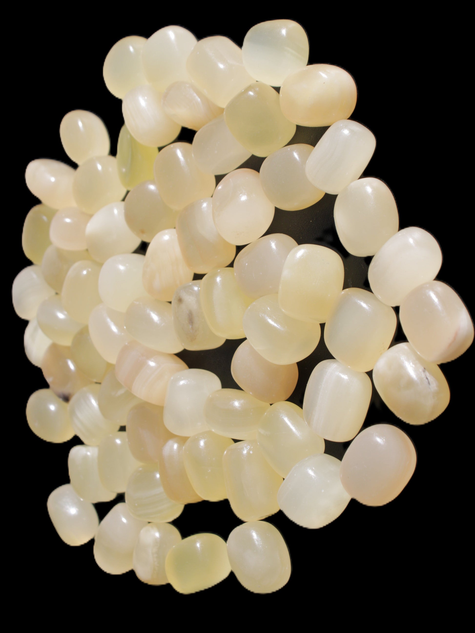 Lemon Calcite 66 tumbled stones 12*9mm - 21*18mm 600g Wholesale in sunlight - Rocks and Things Store