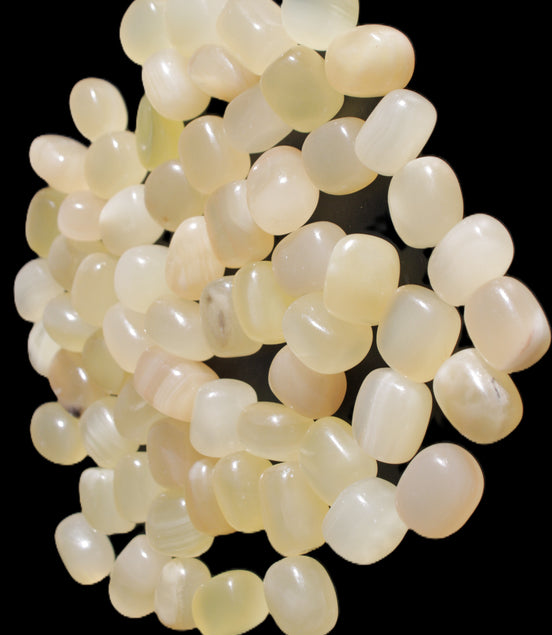 Lemon Calcite 66 tumbled stones 12*9mm - 21*18mm 600g Wholesale in sunlight - Rocks and Things Store
