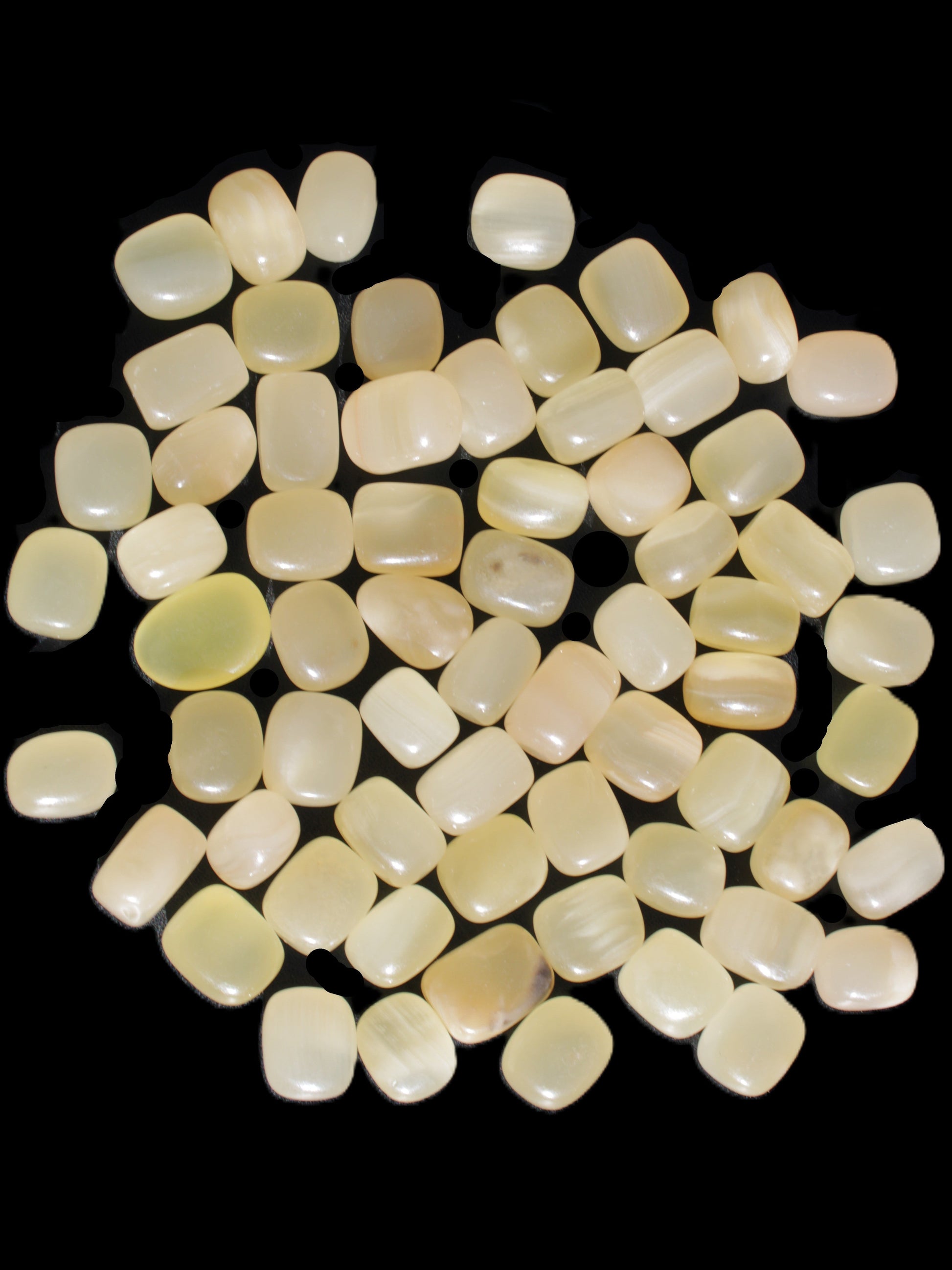Lemon Calcite 66 tumbled stones 12*9mm - 21*18mm 600g Wholesale in sunlight - Rocks and Things Store