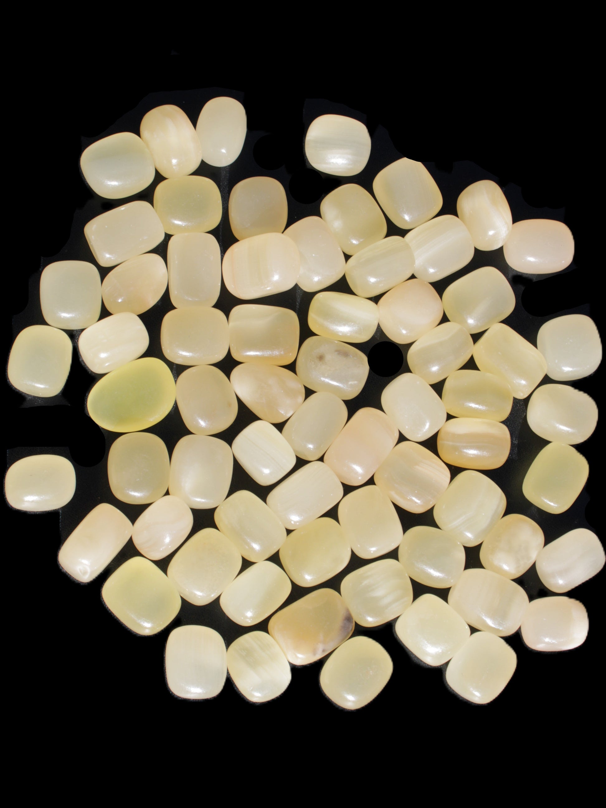 Lemon Calcite 66 tumbled stones 12*9mm - 21*18mm 600g Wholesale in sunlight - Rocks and Things Store