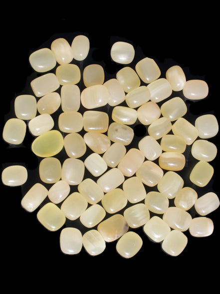 Lemon Calcite 66 tumbled stones 12*9mm - 21*18mm 600g Wholesale in sunlight - Rocks and Things Store