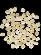 Lemon Calcite 66 tumbled stones 12*9mm - 21*18mm 600g Wholesale in sunlight - Rocks and Things Store