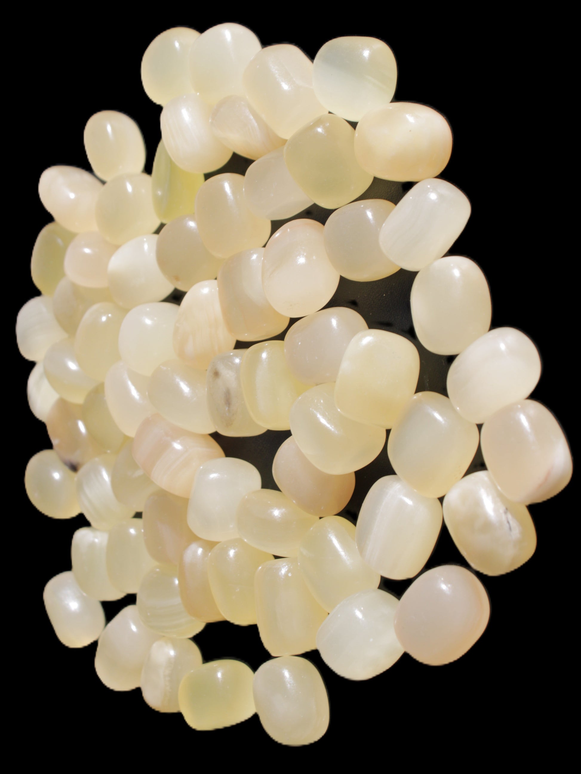 Lemon Calcite 66 tumbled stones 12*9mm - 21*18mm 600g Wholesale in sunlight - Rocks and Things Store