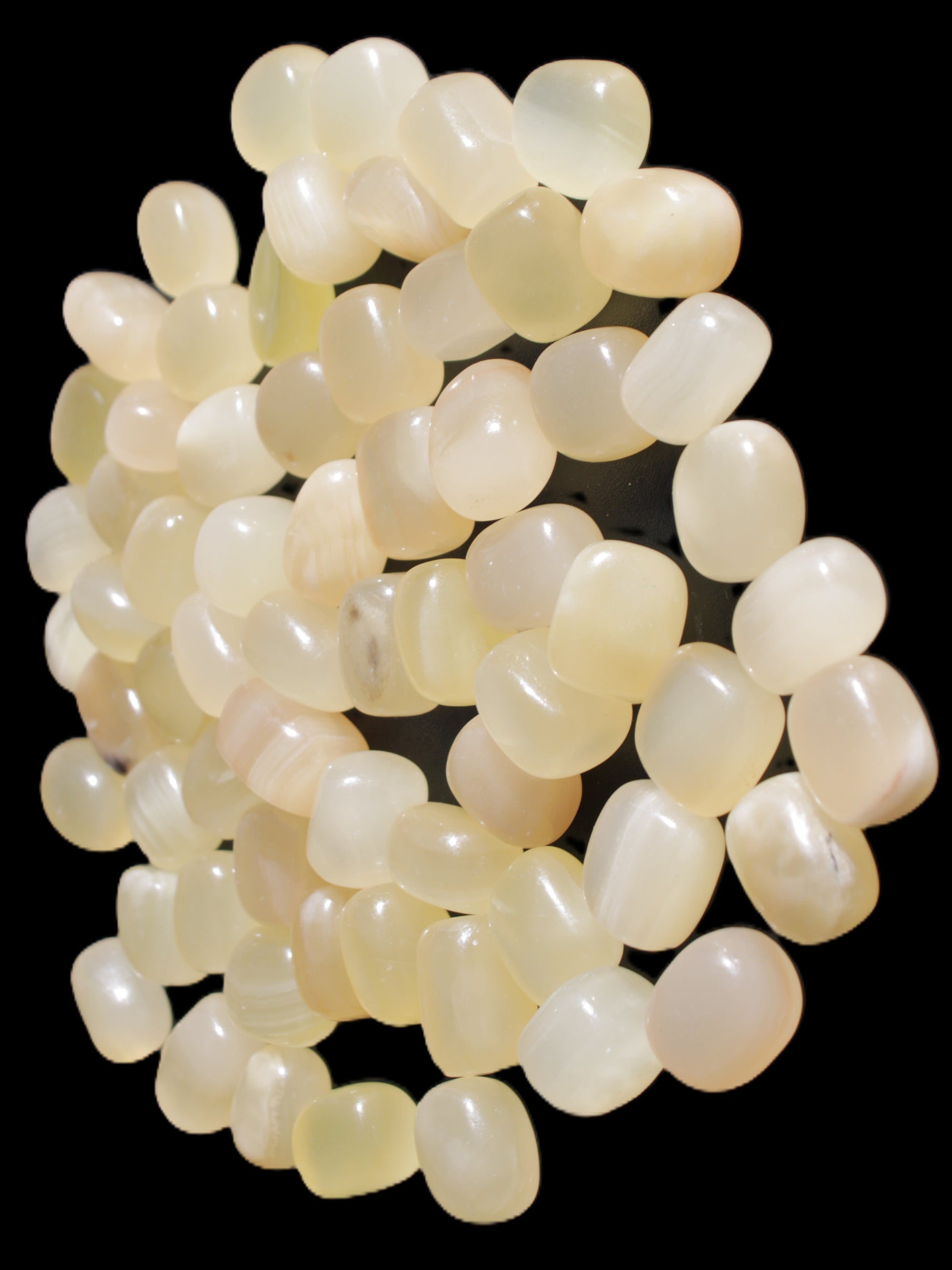 Lemon Calcite 66 tumbled stones 12*9mm - 21*18mm 600g Wholesale in sunlight - Rocks and Things Store