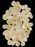 Lemon Calcite 66 tumbled stones 12*9mm - 21*18mm 600g Wholesale in sunlight - Rocks and Things Store