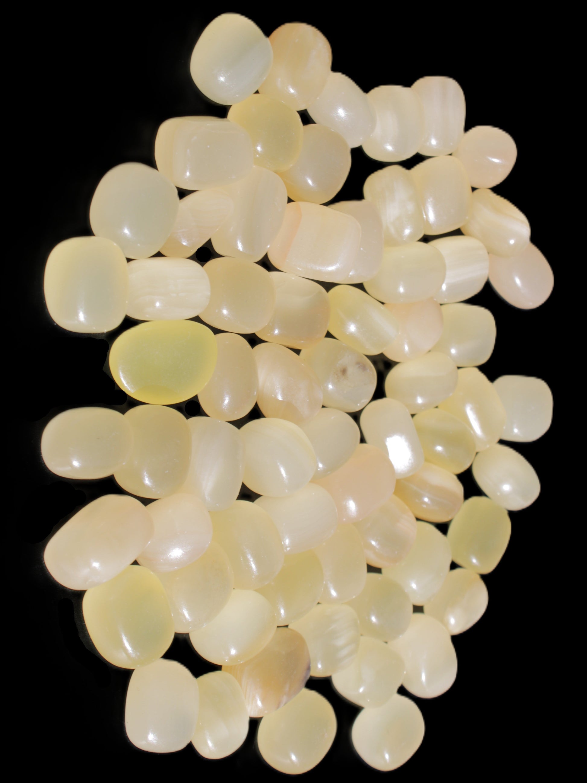 Lemon Calcite 66 tumbled stones 12*9mm - 21*18mm 600g Wholesale in sunlight - Rocks and Things Store