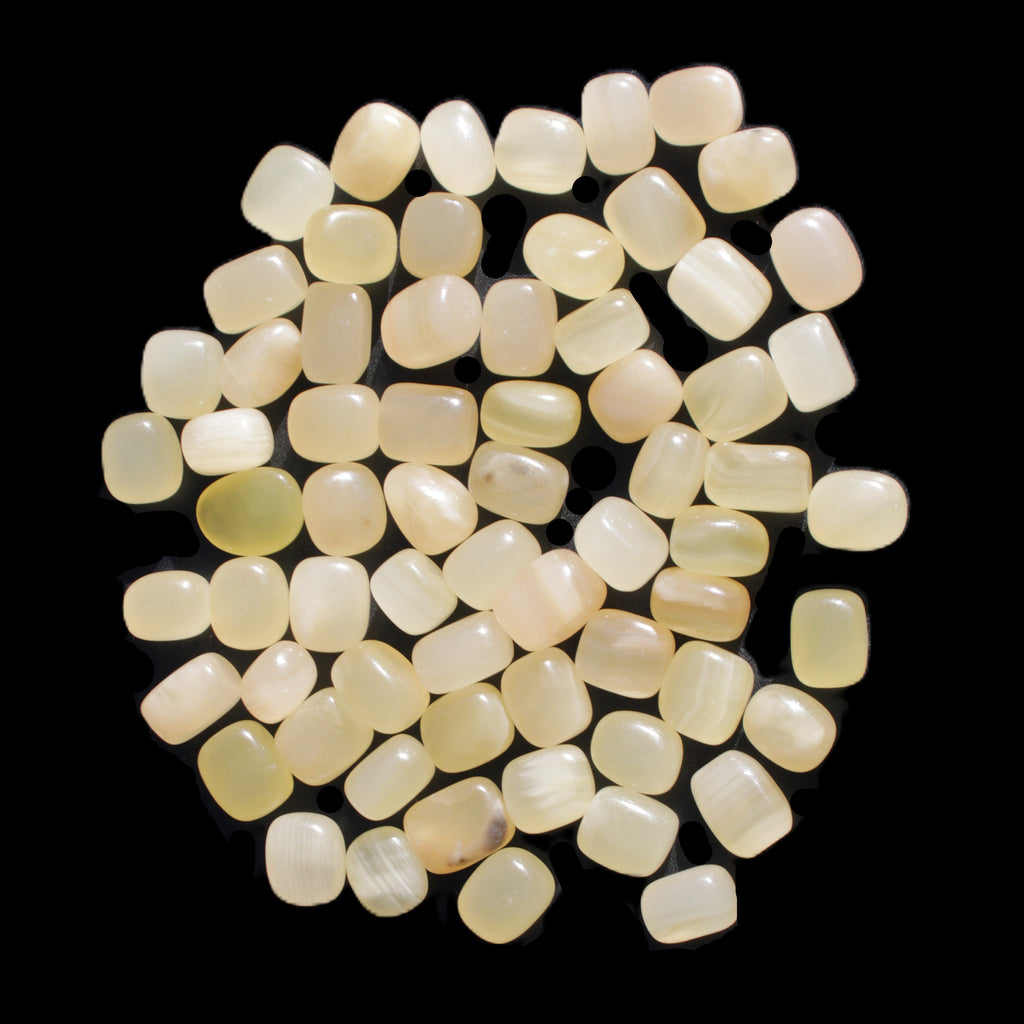 Lemon Calcite 66 tumbled stones 12*9mm - 21*18mm 600g Wholesale in sunlight - Rocks and Things Store