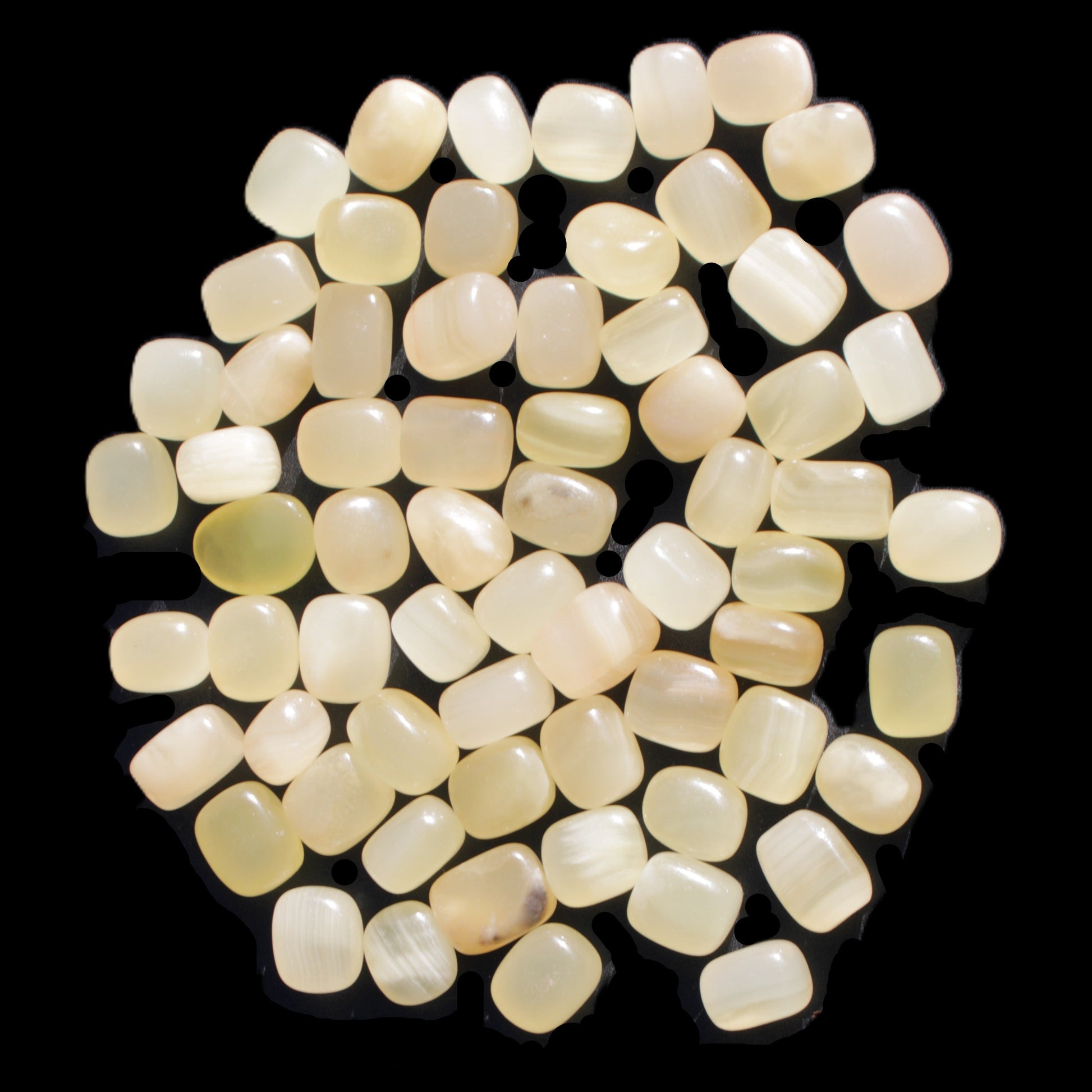 Lemon Calcite 66 tumbled stones 12*9mm - 21*18mm 600g Wholesale in sunlight - Rocks and Things Store