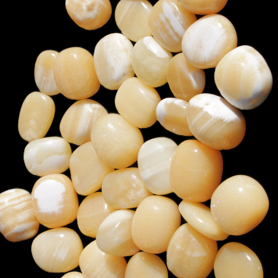 Lemon Calcite 36 tumbled stones 22*18mm - 30-24mm 730g Wholesale in sunlight - Rocks and Things Store