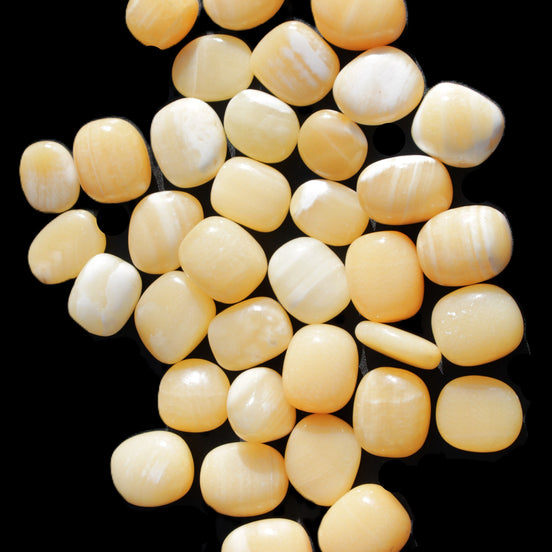 Lemon Calcite 36 tumbled stones 22*18mm - 30-24mm 730g Wholesale in sunlight - Rocks and Things Store