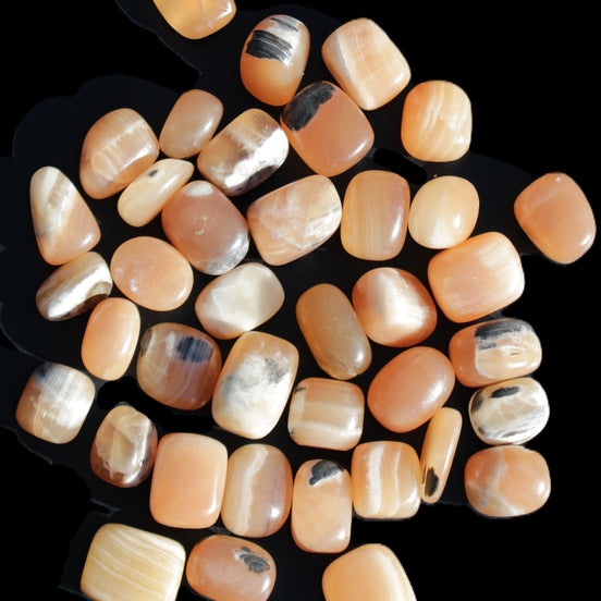 Banded Topaz Honey Calcite 38 tumbled stones 22*12mm - 30*22mm 734g Wholesale in sunlight - Rocks and Things Store