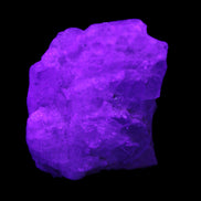 Aquamarine 44*33*19mm 247ct 49.4g in UV light