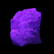 Aquamarine 44*33*19mm 247ct 49.4g in UV light