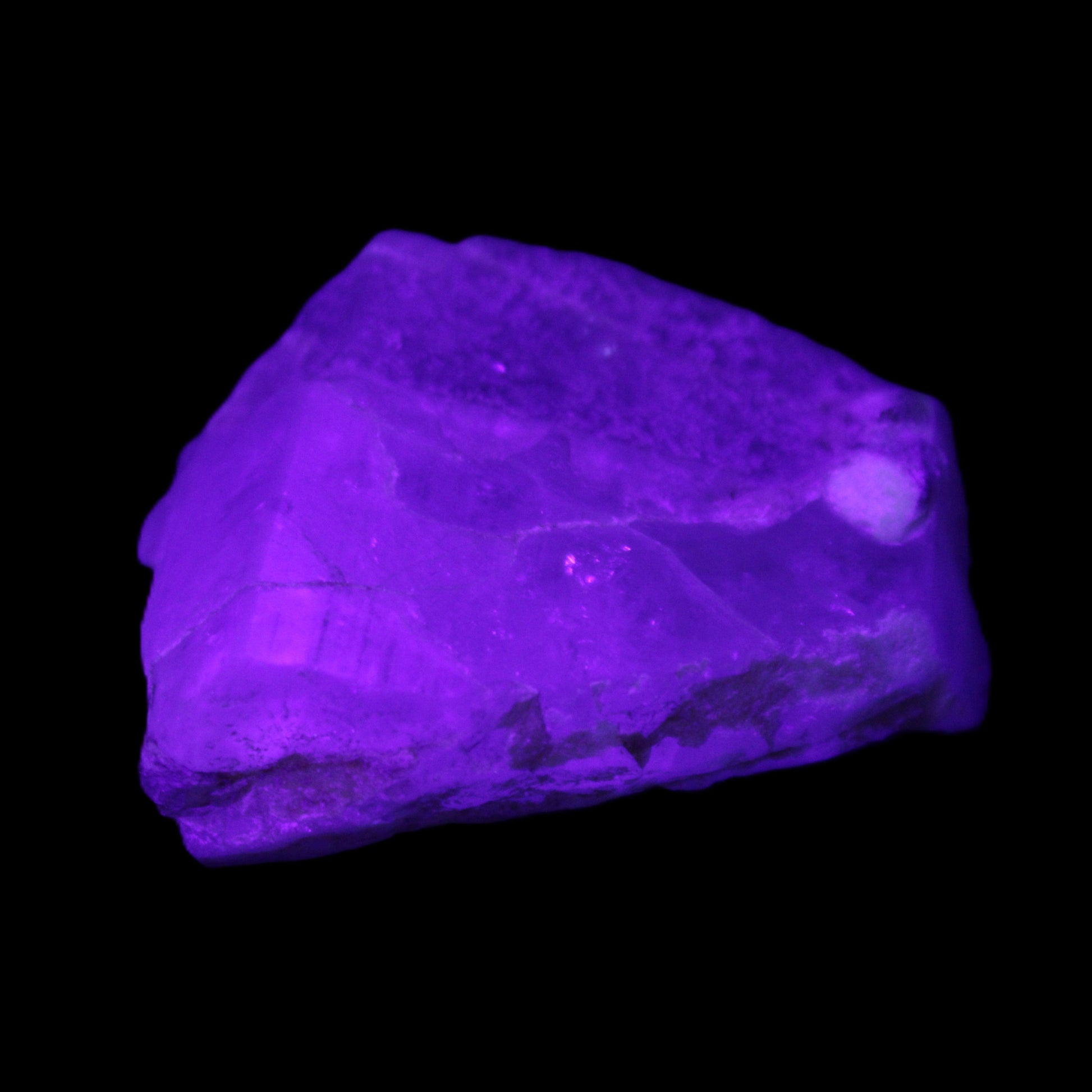 Blue Aquamarine 43*31*18mm 150ct 30g in UV light - Rocks and Things Store