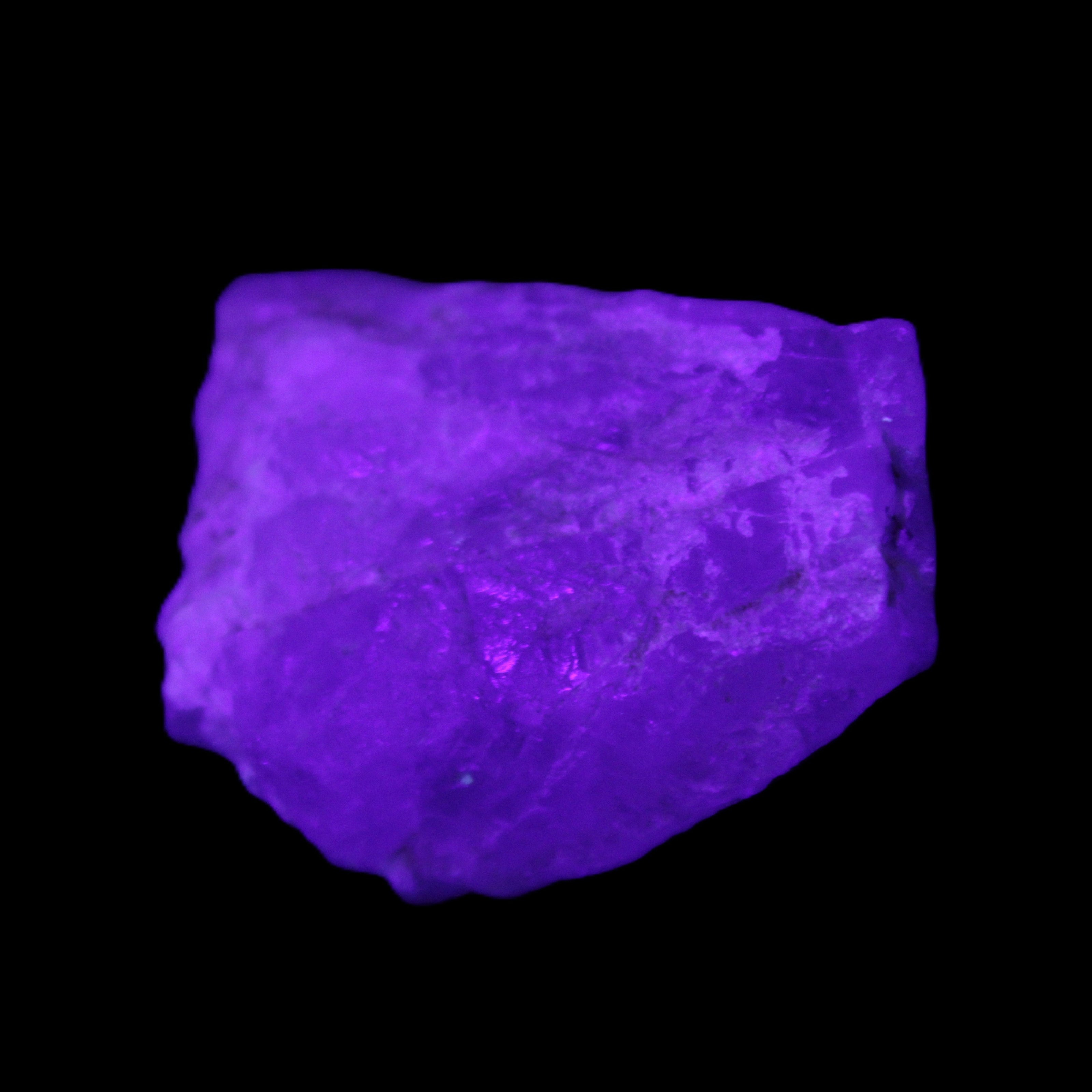 Blue Aquamarine 43*31*18mm 150ct 30g in UV light - Rocks and Things Store