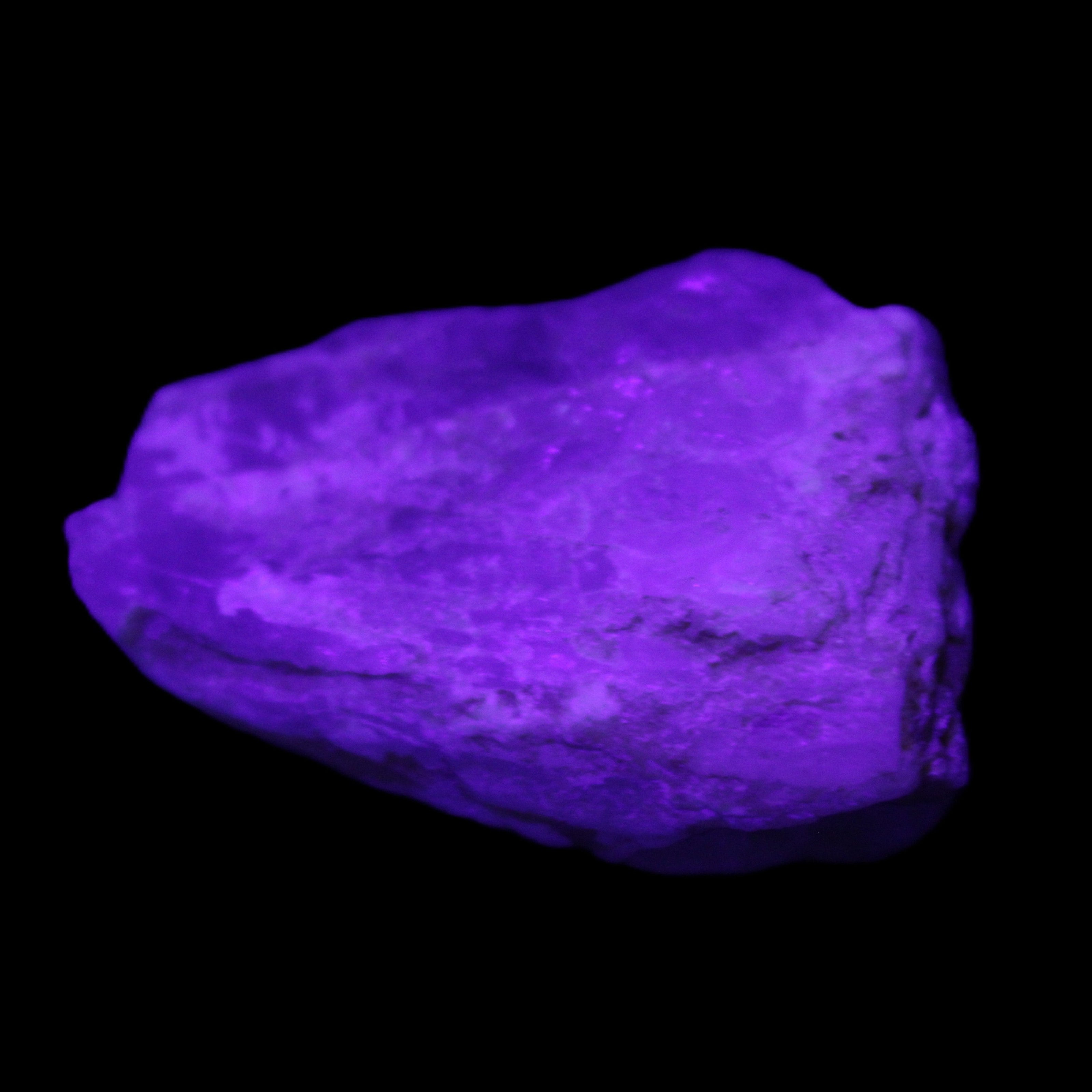 Blue Aquamarine 43*31*18mm 150ct 30g in UV light - Rocks and Things Store