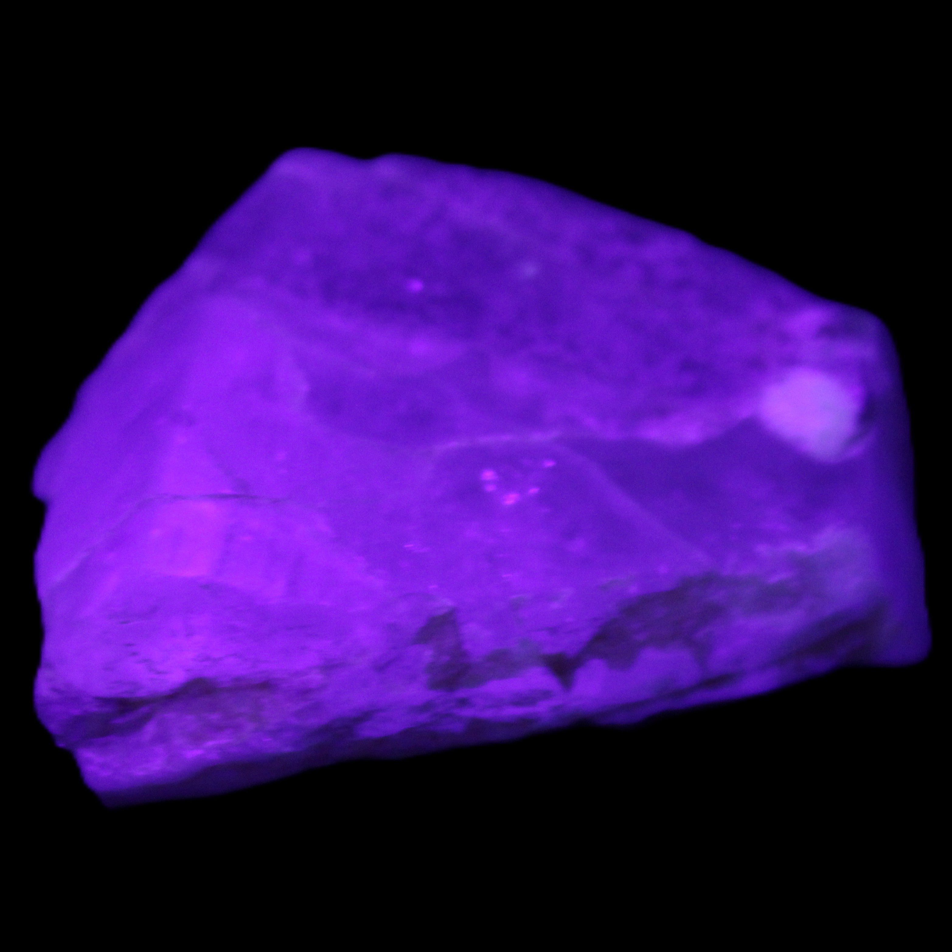 Blue Aquamarine 43*31*18mm 150ct 30g in UV light - Rocks and Things Store