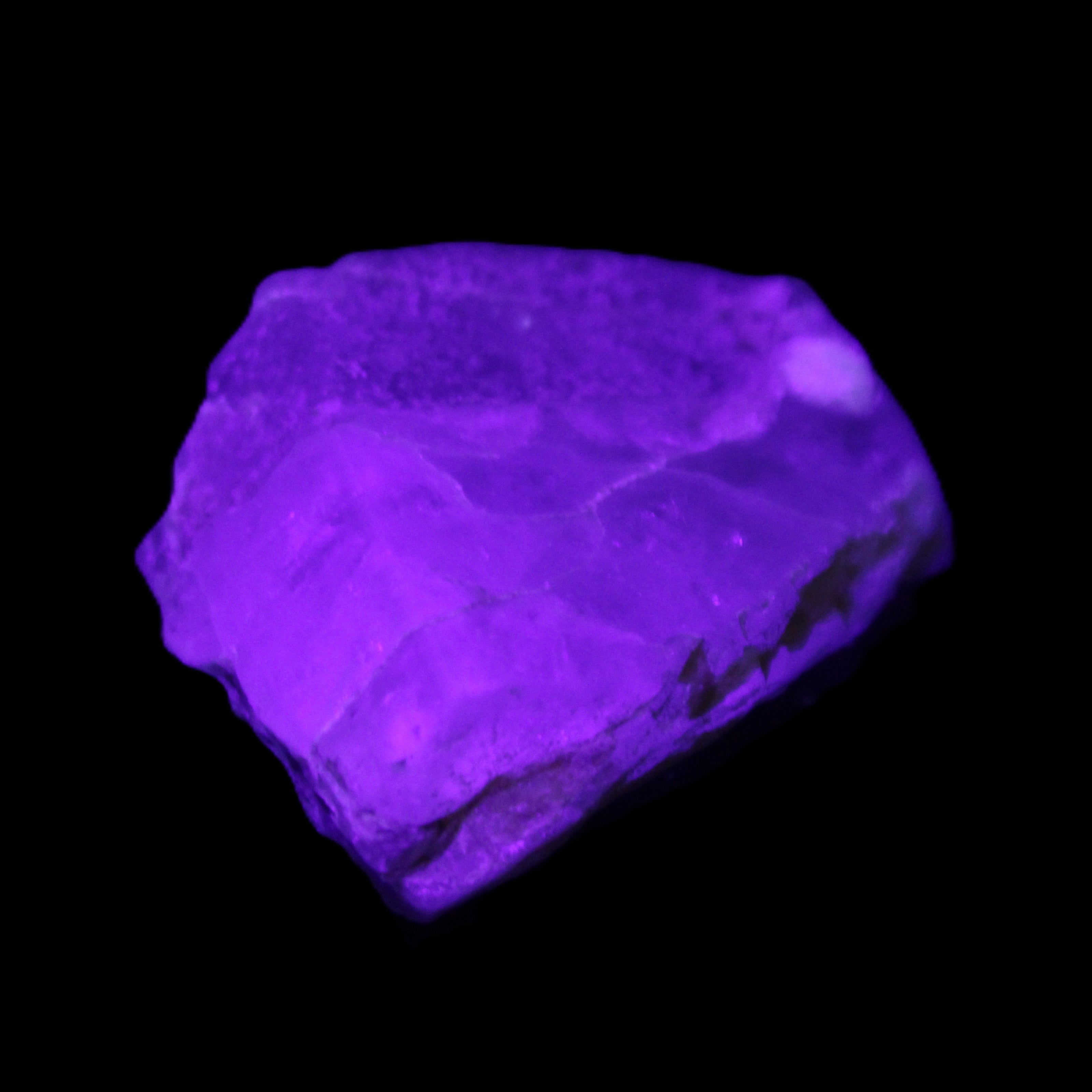 Blue Aquamarine 43*31*18mm 150ct 30g in UV light - Rocks and Things Store