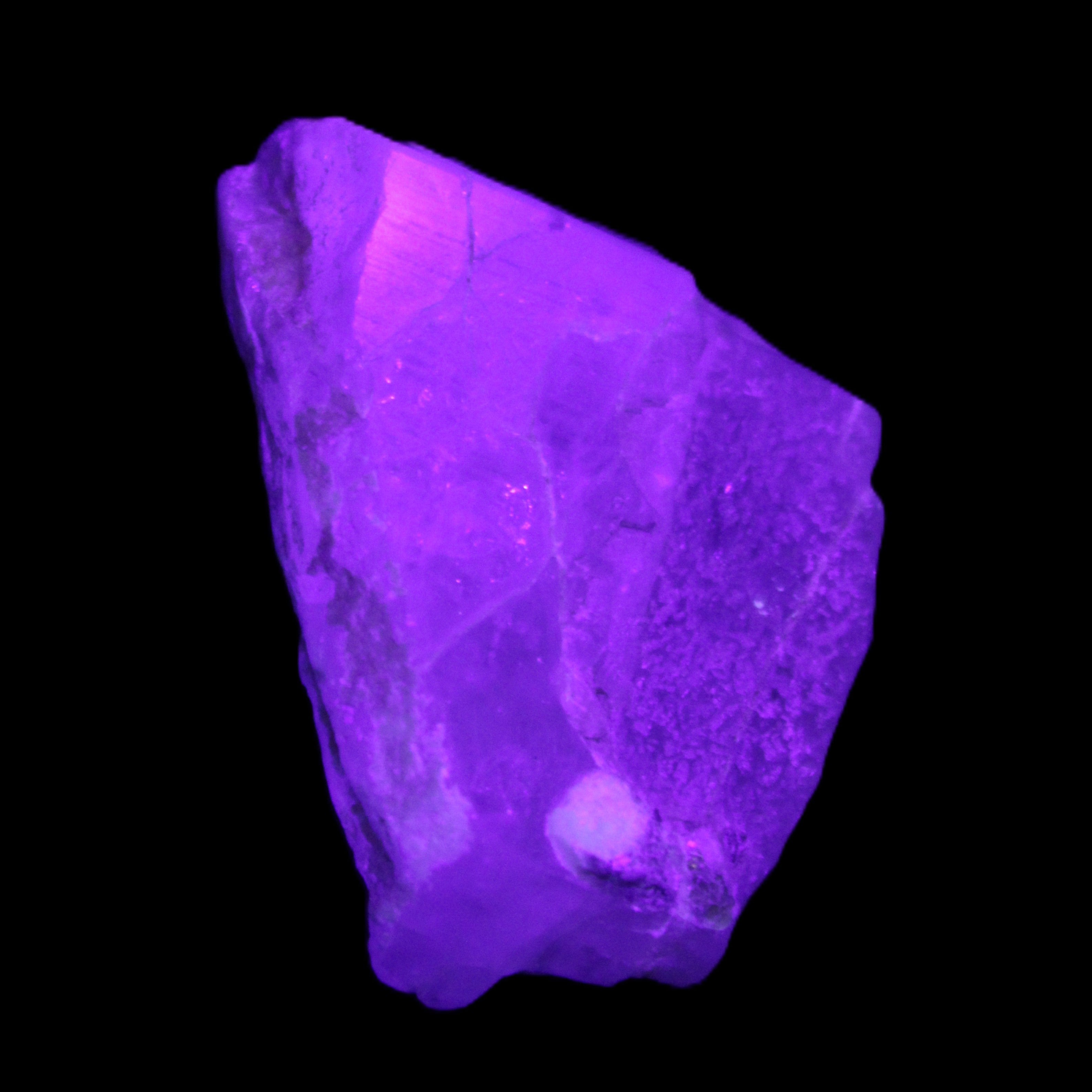 Blue Aquamarine 43*31*18mm 150ct 30g in UV light - Rocks and Things Store