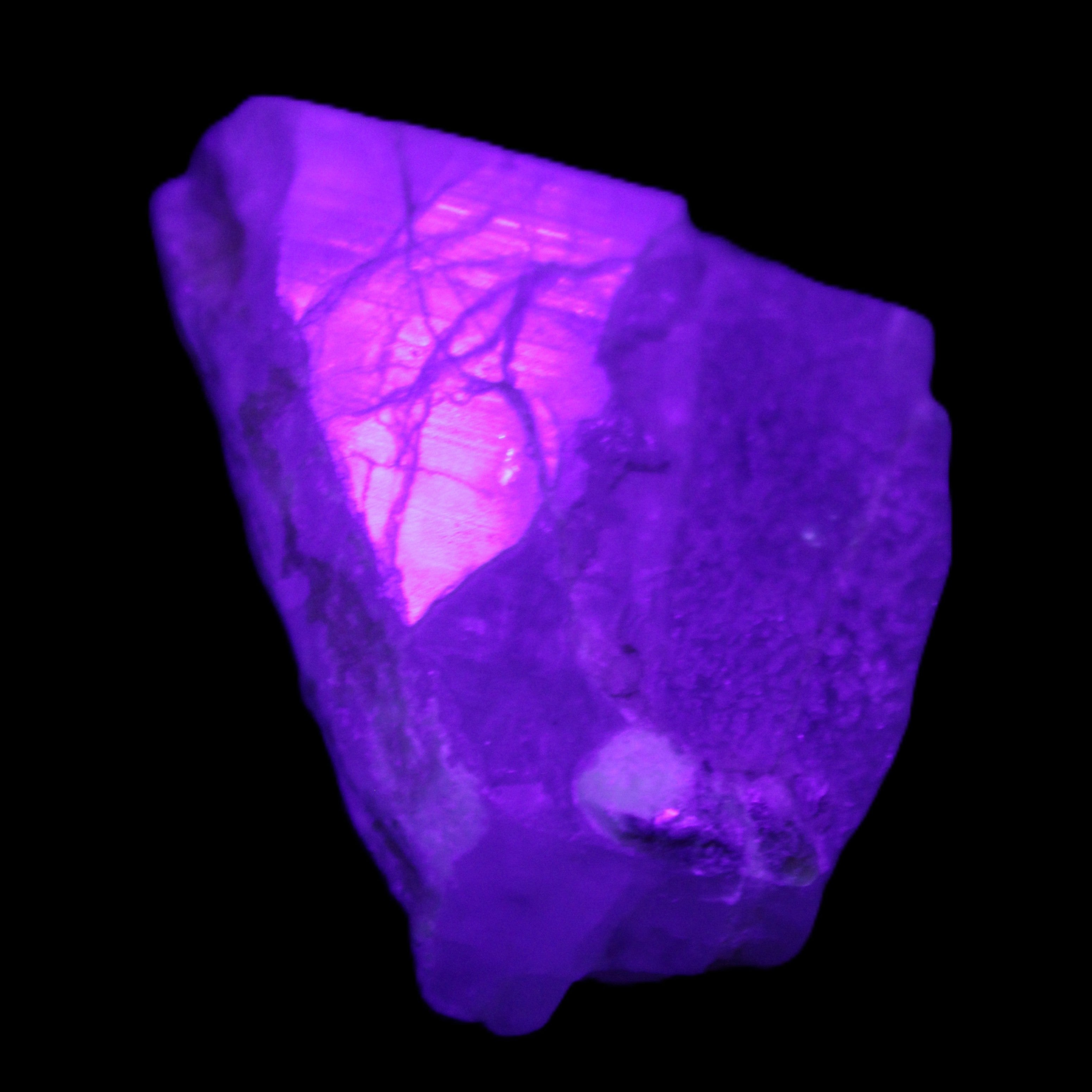 Blue Aquamarine 43*31*18mm 150ct 30g in UV light - Rocks and Things Store