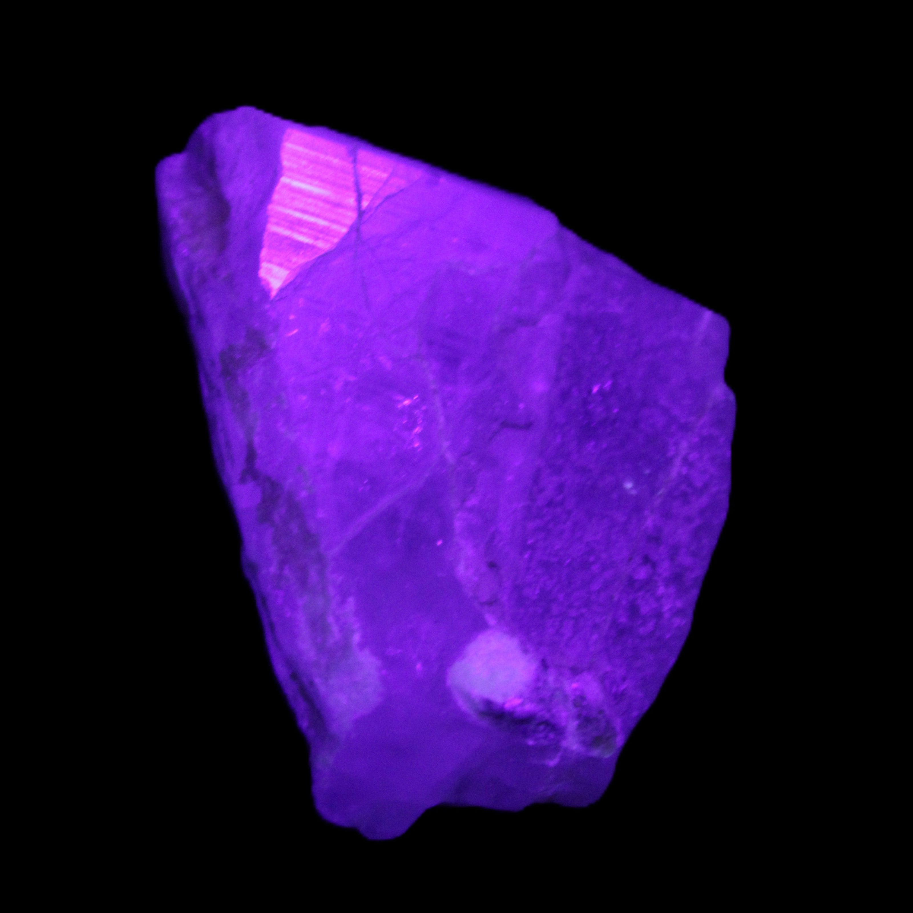 Blue Aquamarine 43*31*18mm 150ct 30g in UV light - Rocks and Things Store