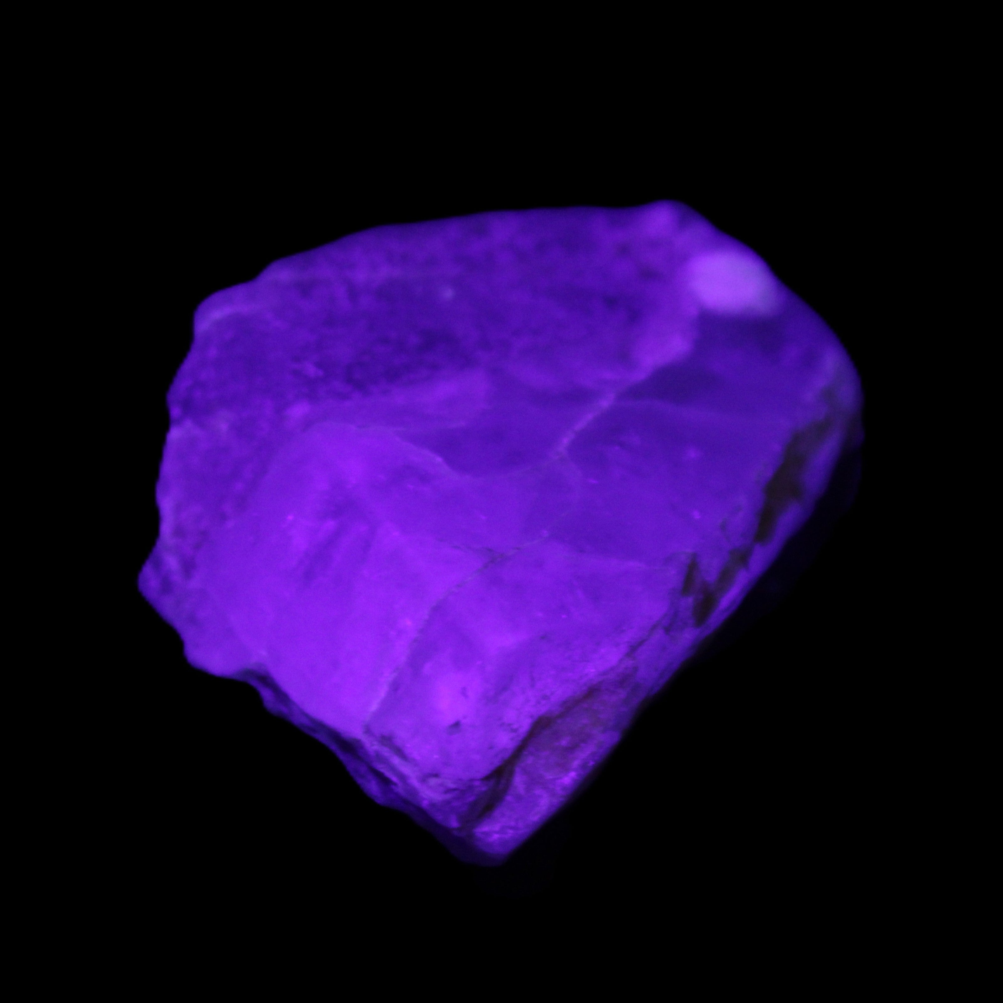 Blue Aquamarine 43*31*18mm 150ct 30g in UV light - Rocks and Things Store