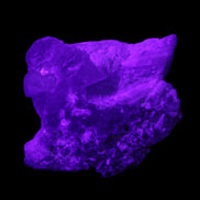 Aquamarine crystal on Quartz and Mica matrix 47*45*29mm 420.5ct 84.1g in UV light - Rocks and Things Store