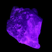 Aquamarine crystal on Quartz and Mica matrix 47*45*29mm 420.5ct 84.1g in UV light - Rocks and Things Store