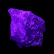 Aquamarine crystal on Quartz and Mica matrix 47*45*29mm 420.5ct 84.1g in UV light - Rocks and Things Store