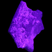 Aquamarine crystal on Quartz and Mica matrix 47*45*29mm 420.5ct 84.1g in UV light - Rocks and Things Store