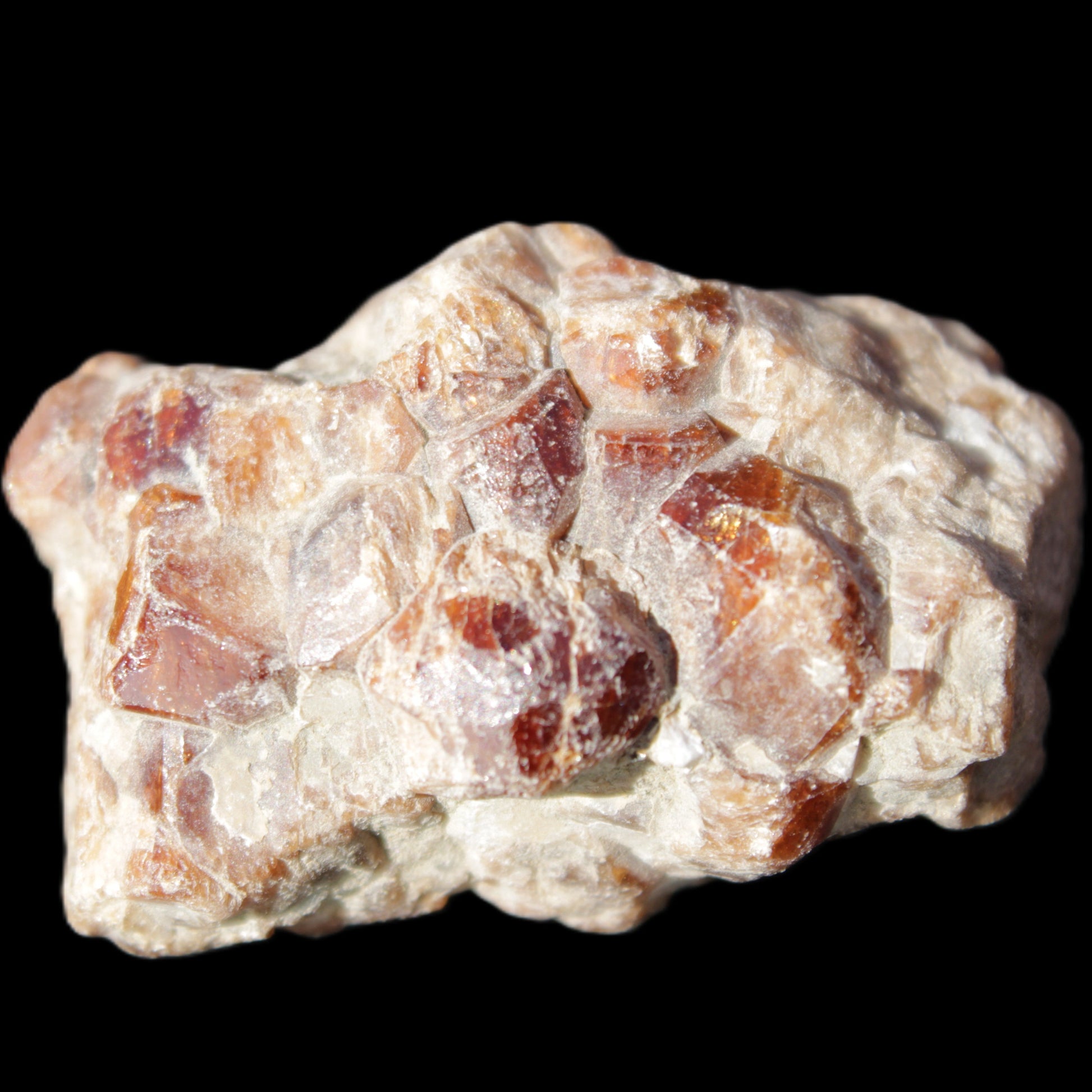Spessartine garnet cluster 45*38*27mm 334ct 66.8g in sunlight 
 - Rocks and Things Store
