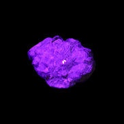 Spessartine garnet cluster 45*38*27mm 334ct 66.8g in UV light 
 - Rocks and Things Store