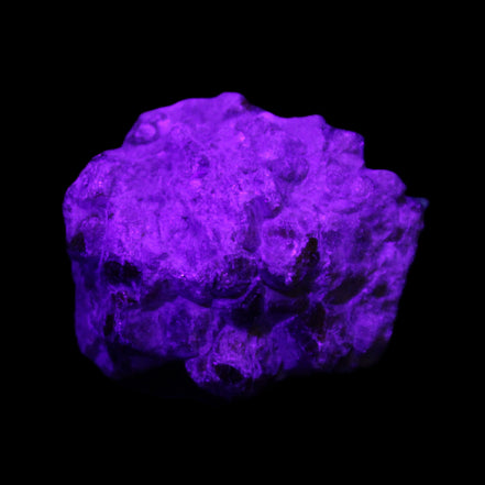 Spessartine garnet cluster 45*38*27mm 334ct 66.8g in UV light 
 - Rocks and Things Store