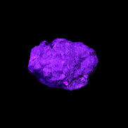 Spessartine garnet cluster 45*38*27mm 334ct 66.8g in UV light 
 - Rocks and Things Store