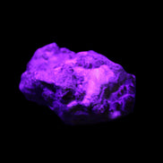 Spessartine garnet cluster 45*38*27mm 334ct 66.8g in UV light 
 - Rocks and Things Store