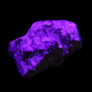 Spessartine garnet cluster 45*38*27mm 334ct 66.8g in UV light 
 - Rocks and Things Store