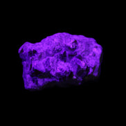 Spessartine garnet cluster 45*38*27mm 334ct 66.8g in UV light 
 - Rocks and Things Store