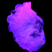 Spessartine Garnet Elbaite Mica Quartz Feldspar matrix 60*30*44mm 329ct 65.8g in UV light - Rocks and Things Store