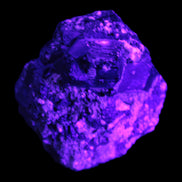 Amazing Black Tourmaline cluster 64*31mm 243.7g in UV light - Rocks and Things Store