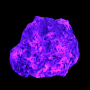 Aquamarine in Mica Feldspar matrix 40*31*18mm  24.3g in UV light - Rocks and Things Store