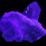 Elestial Quartz Soulmate cluster with Feldspar and Mica Bridge 424g in UV light