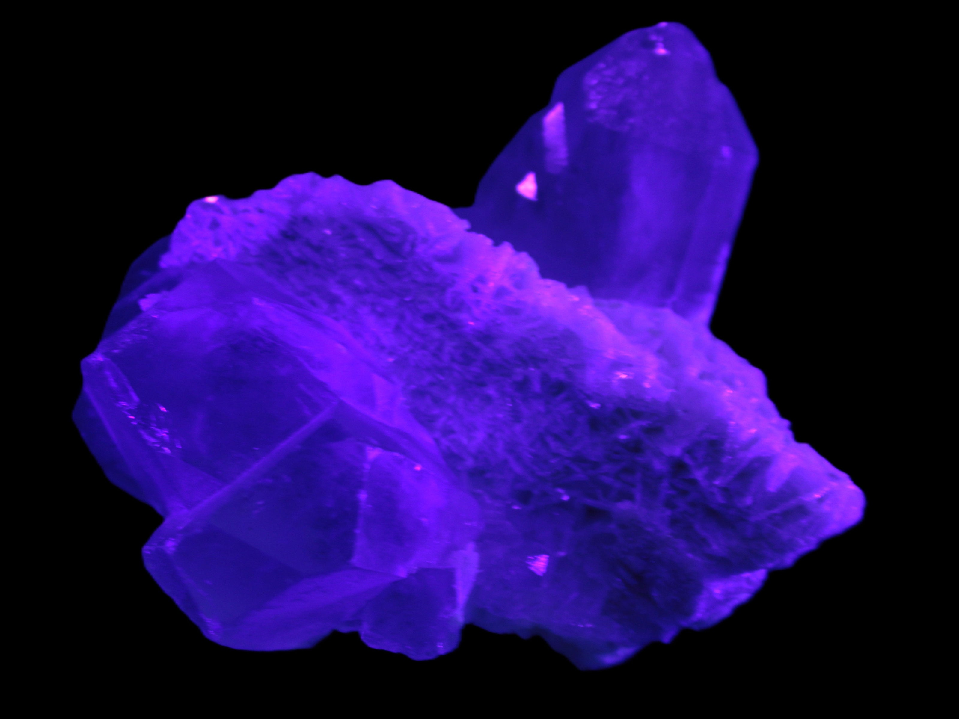 Elestial Quartz Soulmate cluster with Feldspar and Mica Bridge 424g in UV light