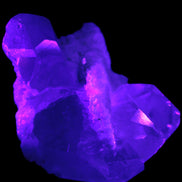 Elestial Quartz Soulmate cluster with Feldspar and Mica Bridge 424g in UV light