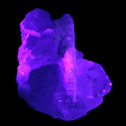 Elestial Quartz Soulmate cluster with Feldspar and Mica Bridge 424g in UV light - Rocks and Things Store