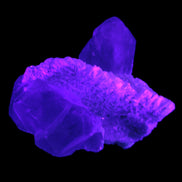 Elestial Quartz Soulmate cluster with Feldspar and Mica Bridge 424g in UV light - Rocks and Things Store