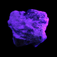 Epidote crystal specimen from Iran in matrix 43*35*15mm 43.7g in UV light - Rocks and Things Store