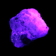 Epidote crystal specimen from Iran in matrix 43*35*15mm 43.7g in UV light - Rocks and Things Store