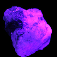 Epidote crystal specimen from Iran in matrix 43*35*15mm 43.7g in UV light - Rocks and Things Store