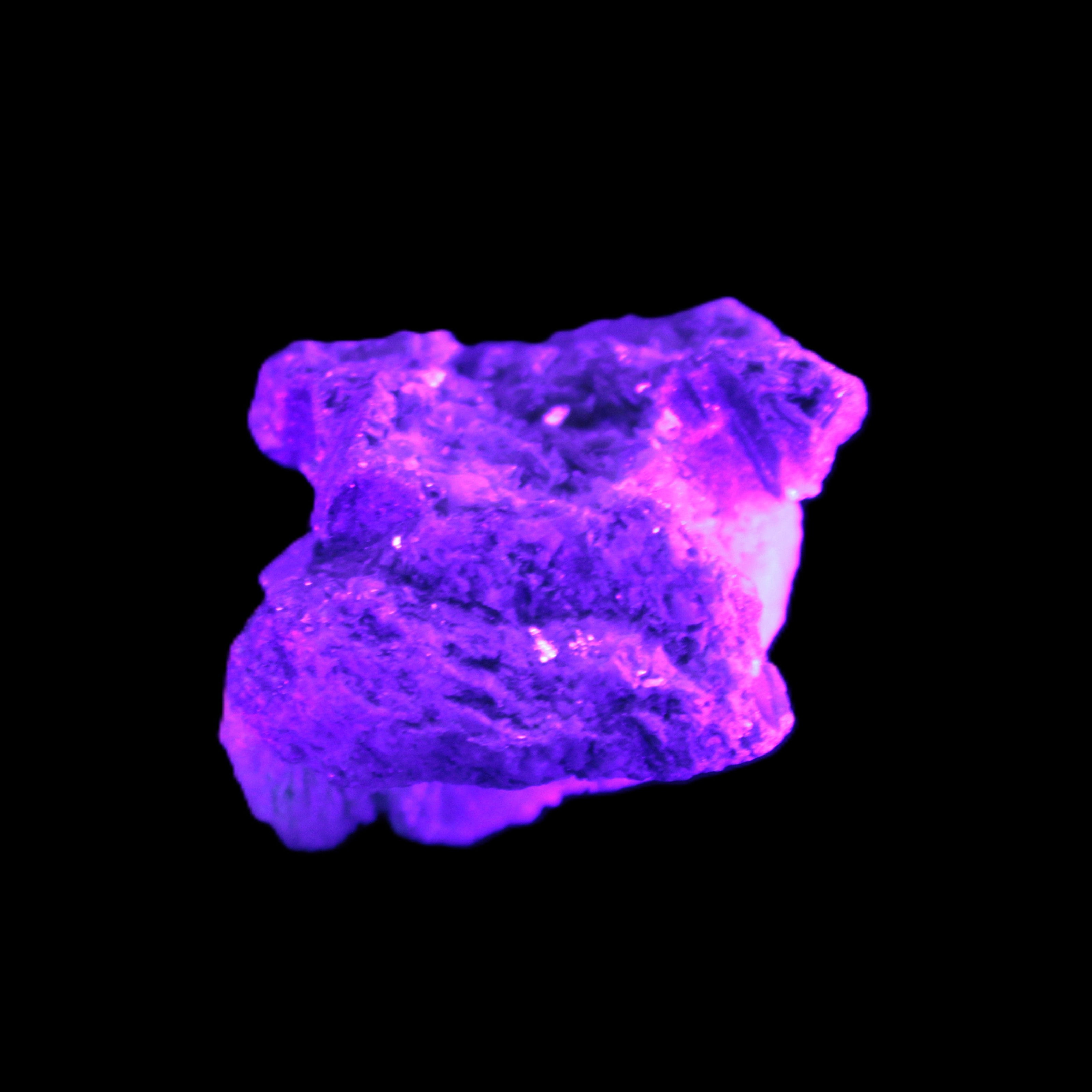 Tiny Aquamarine crystals in Mica, Lepidolite Feldspar matrix 46*42*30mm 198ct 39.6g in UV light -  Rocks and Things Store