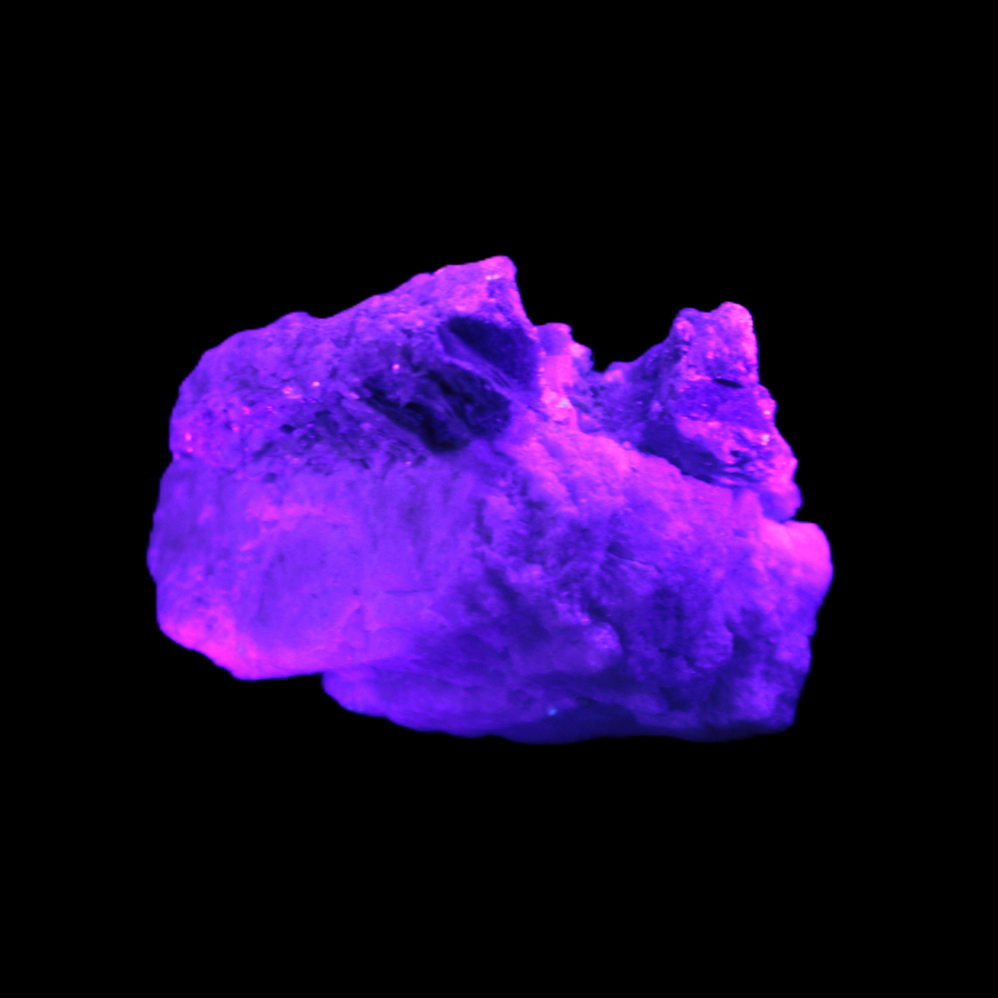 Tiny Aquamarine crystals in Mica, Lepidolite Feldspar matrix 46*42*30mm 198ct 39.6g in UV light - Rocks and Things Store